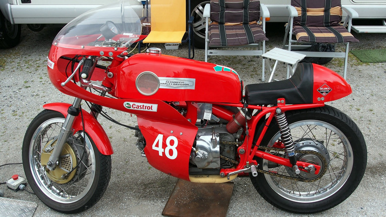 Red 1971 Aermacchi Harley-Davidson parked outside