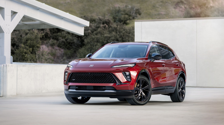 Red 2024 Buick Envision ST parked