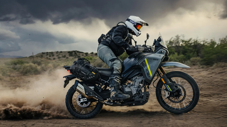 CFMoto Ibex 450 being ridden in the dirt