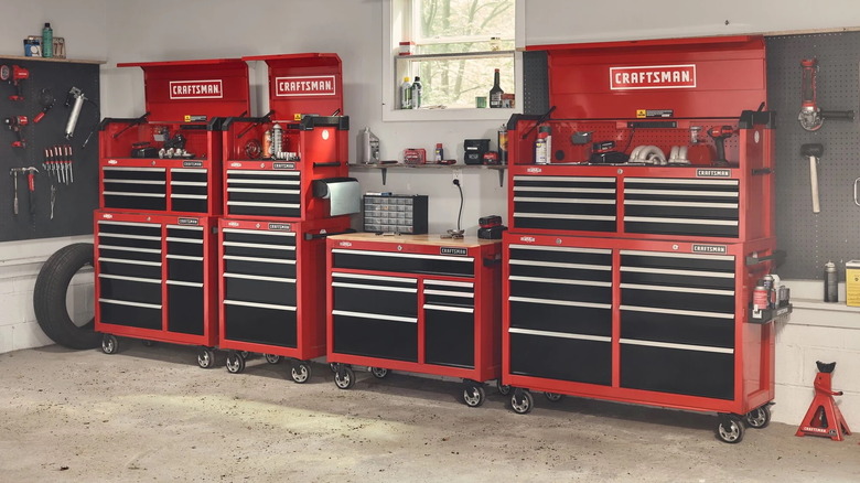 seven differently-sized Craftsman tool cabinets in a garage
