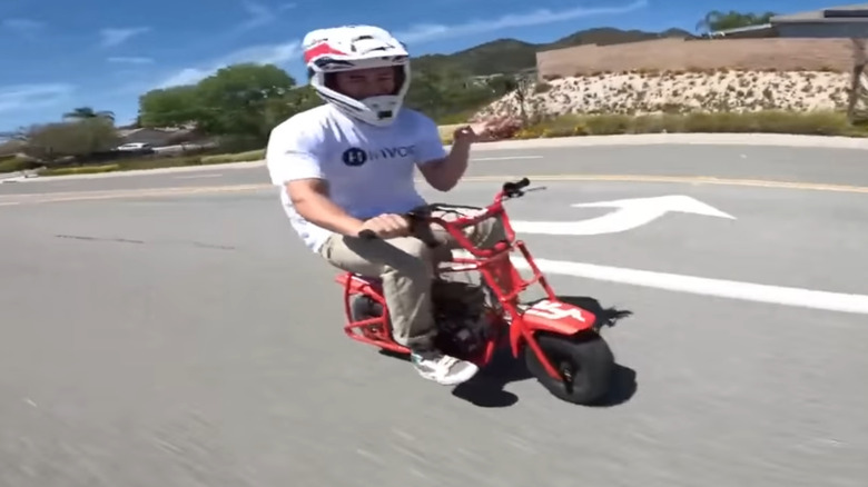 A rider on the FRP mini bike