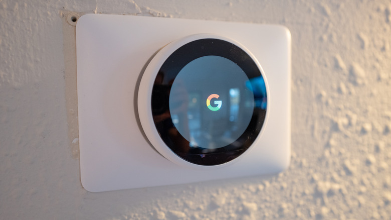 Google home thermostat mounted on the wall