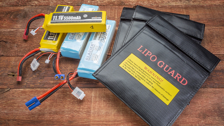 LiPo (lithium polymer) batteries used in drones and RC model with protective, fireproof, charging bags.