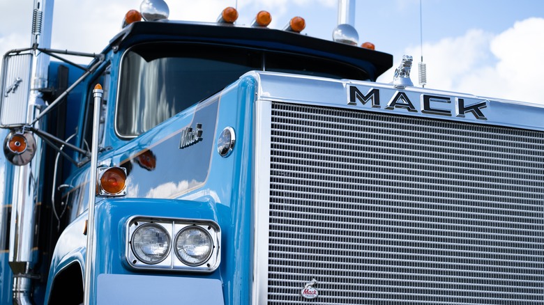 Blue Mack Truck with close up of grille