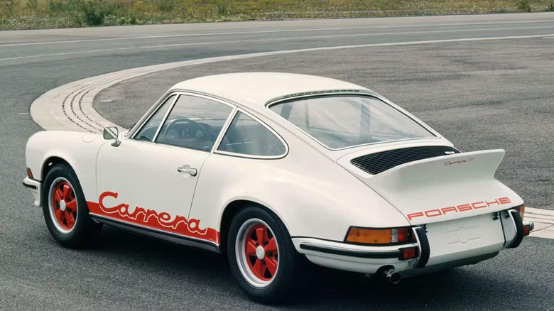 1973 Porsche 911 Carrera 2.7 RS with 2.7L magnesium engine block, rear-left three-quarter view