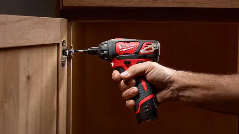 Milwaukee M12 ¼-inch Hex Screwdriver in use