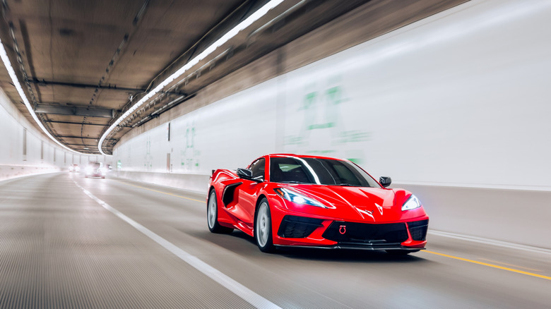 Chevrolet Corvette C8 driving in underground tunnel, front-view