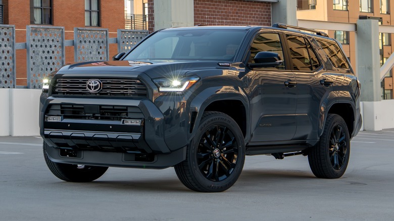 Black 2025 Toyota 4Runner Platinum parked in front of buildings