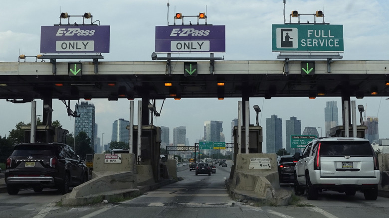 Motorists passing through a toll road.