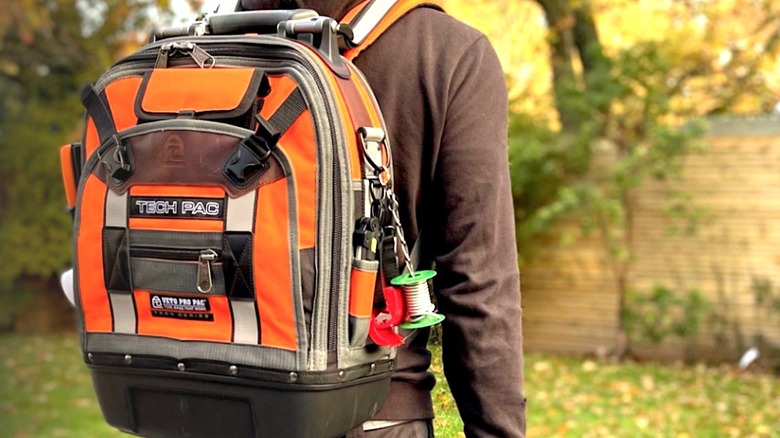 Person wearing Veto Pro Pack Backpack