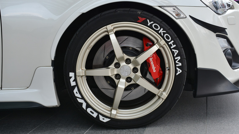 Yokohama Advan white-letter tires on Toyota 86, front-right tire