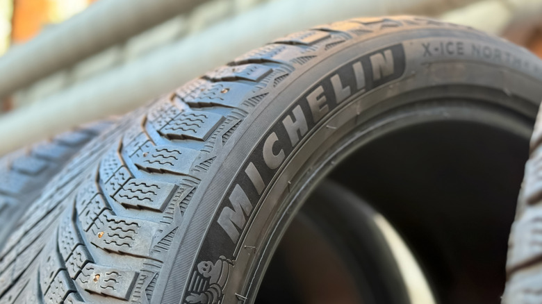Close-up of Michelin X-Ice tire on a tire rack