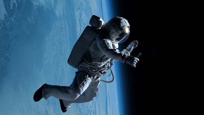 astronaut floating in space