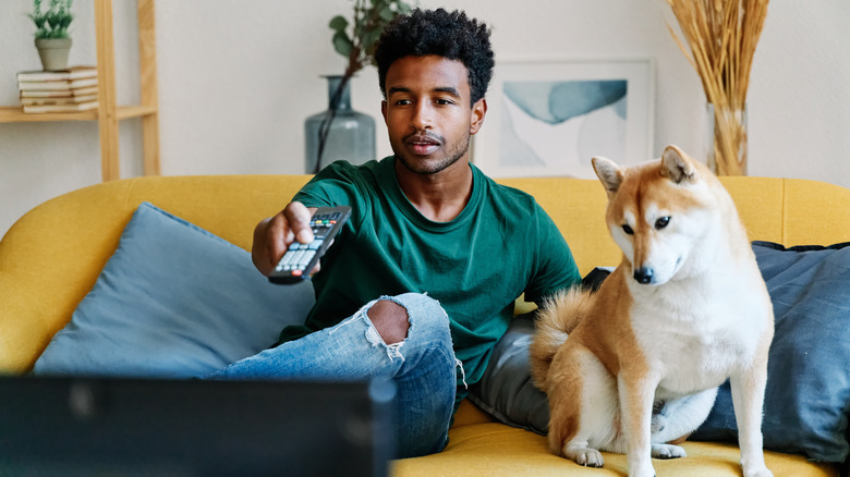 man watching TV