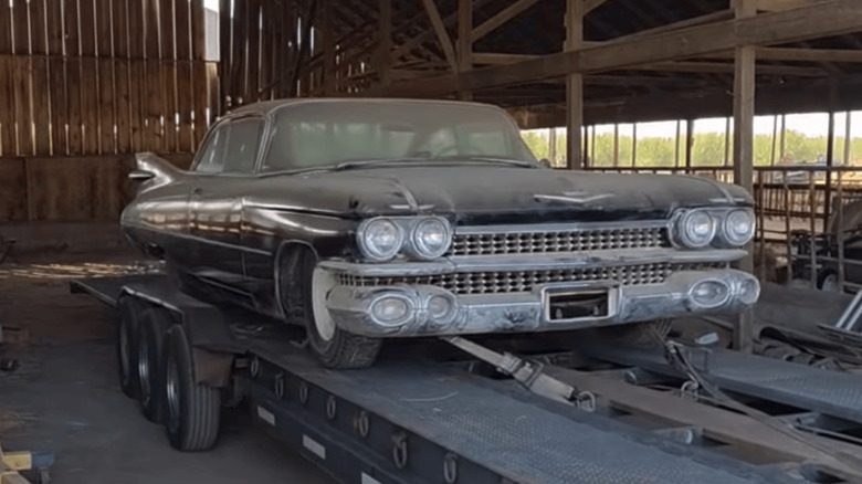 Front shot of barn find 1959 Cadillac DeVille on trailer