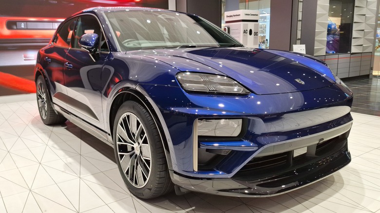 Porsche Macan Electric on display in a showroom
