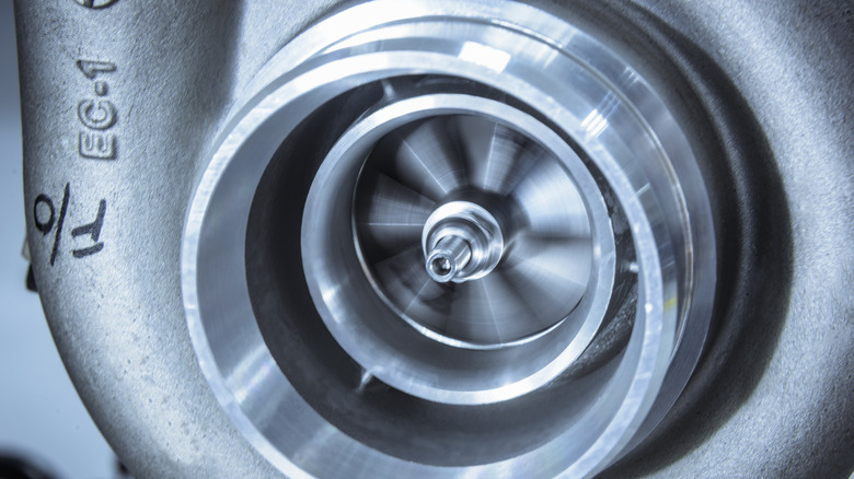 Close-up of turbocharger showing impeller in operation