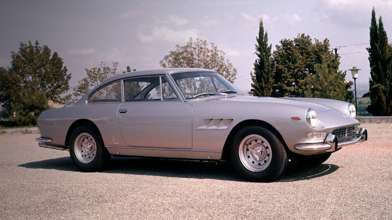 1964 Ferrari 330 GT 2+2 in gray, parked in lot, right-side view