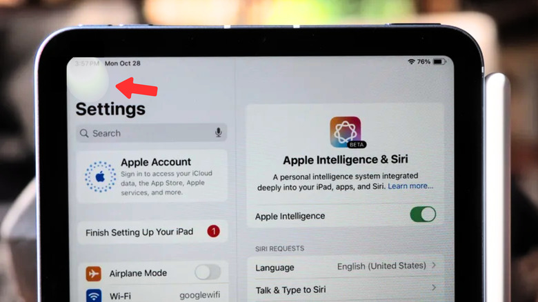An iPad's screen showing the settings menu with a bright spot at the top left