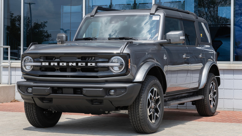 A Ford Bronco parked outside a building