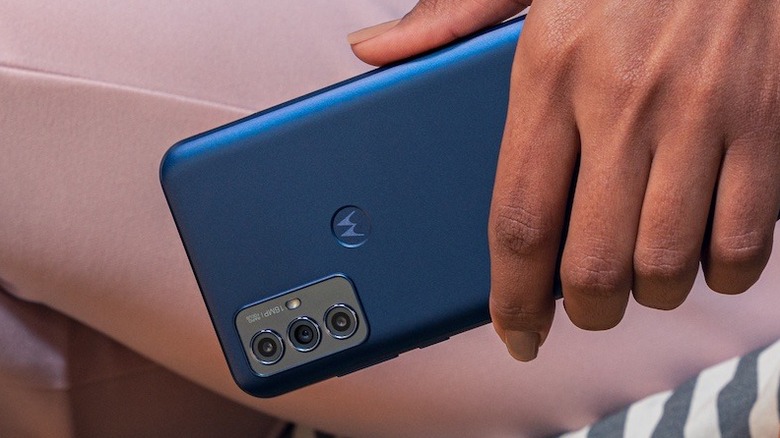 Person holding Moto G Play