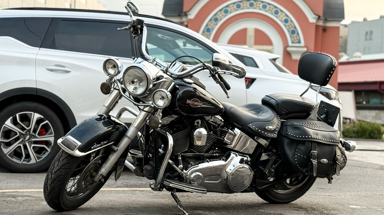 Black Harley-Davidson HERITAGE SOFTAIL CLASSIC in the city street