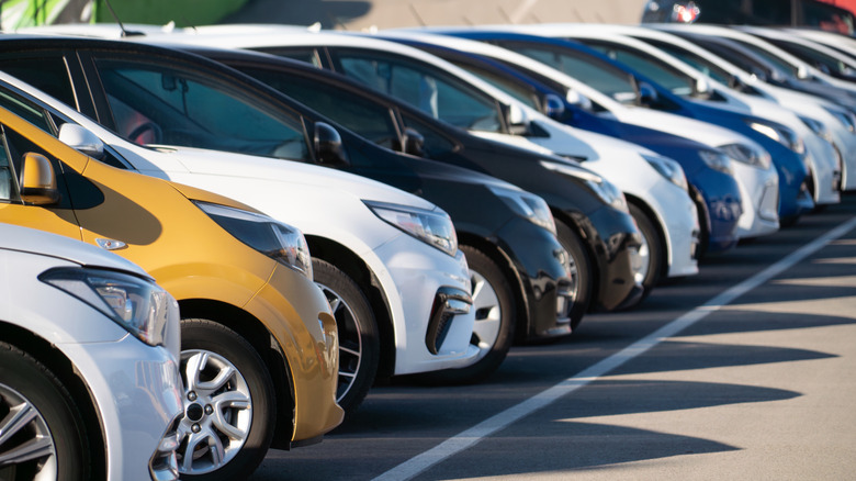 a row of cars on a sales lot