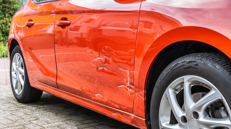 scrape along the side of a car