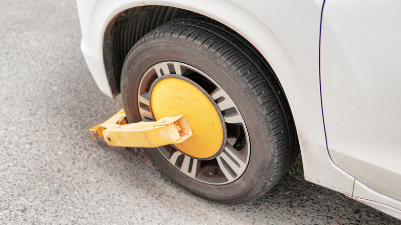A car wheel with a boot attached.