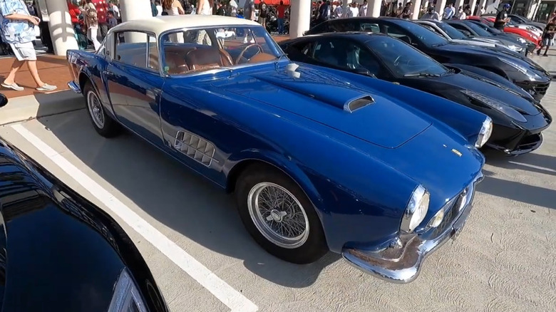 A row of cars at the Cars and Coffee show in San Clemente