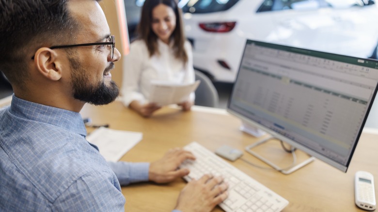 Close up of man typing