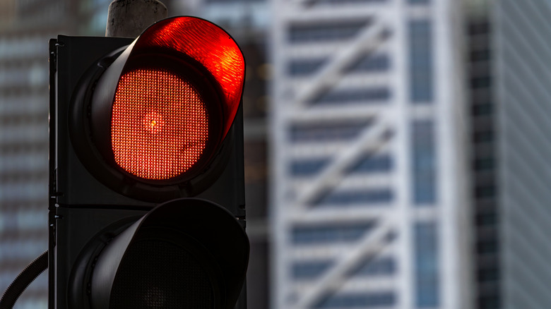 Close-up of a red light at a traffic light