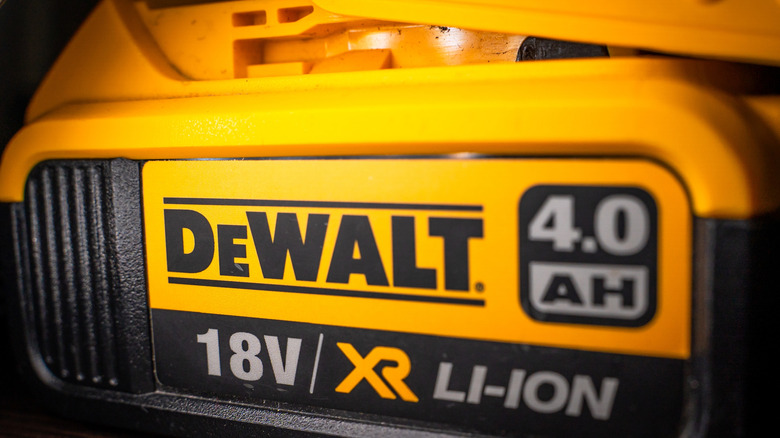 A close-up of an 18V DeWalt battery