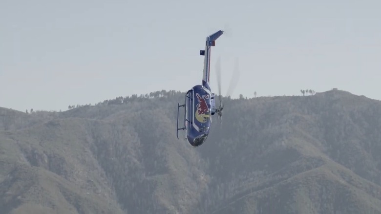 Aaron Fitzgerald piloting the Red Bull BO-105 helicopter
