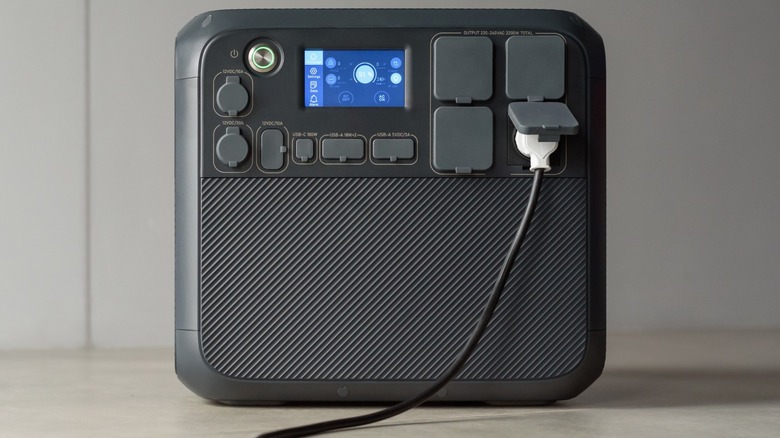 Black power station plugged in