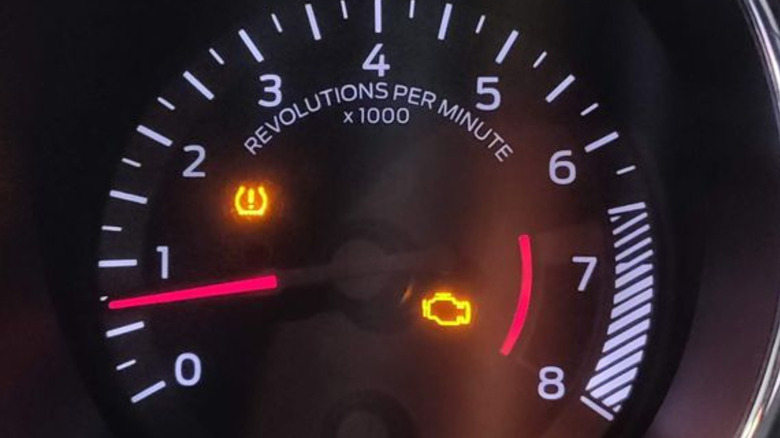 Instrument cluster with a check engine light