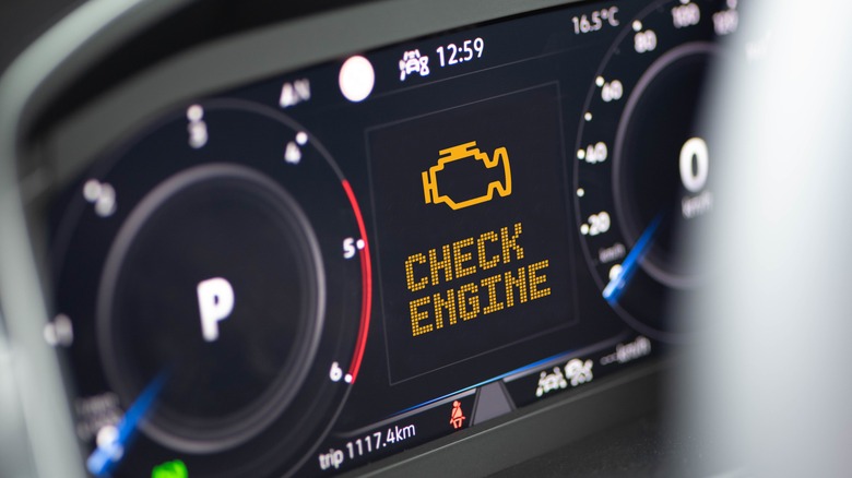 interior of car and check engine light flashing