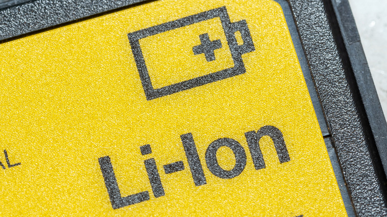 Lithium-ion printed on the side of a battery.