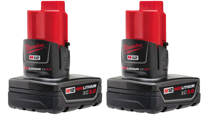 Two Milwaukee M12 Redlithium batteries