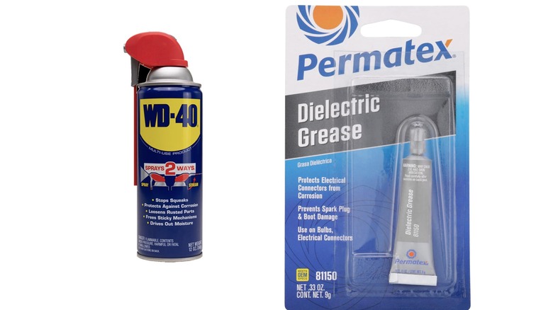 Can of WD-40 and tube of permatex dielectric grease side by side on white background