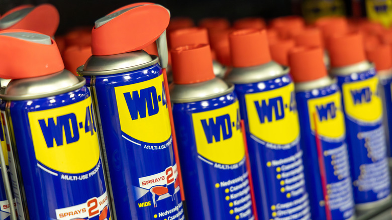 Cans of WD-40 on a store shelf