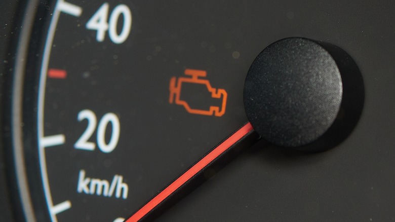 Check engine light icon on instrument panel