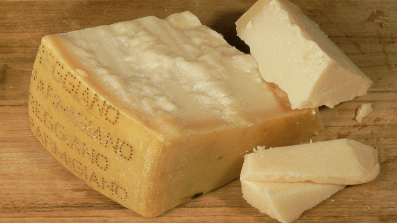 Chunks of Parmigiano-Reggiano cheese with a stamped label
