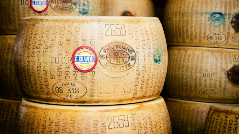 Wheels of authentic Parmigiano-Reggiano