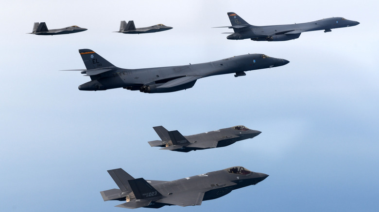 Six military aircraft flying together