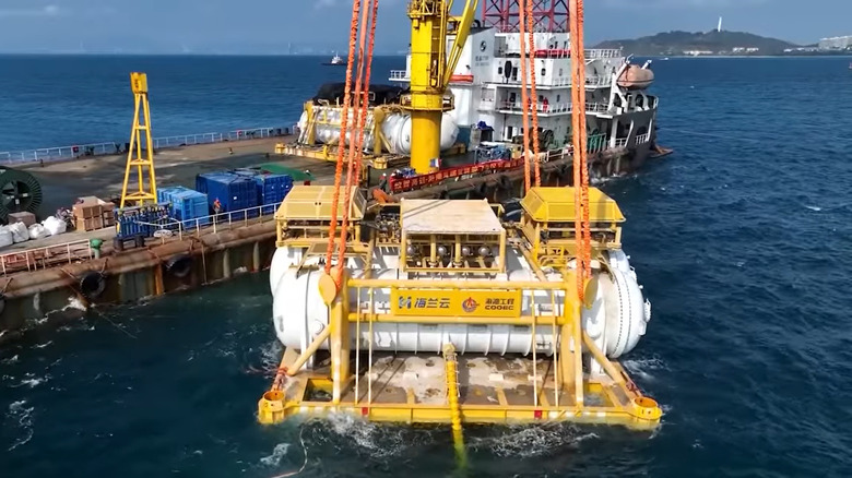 Hainan data center capsule being lowered into the sea