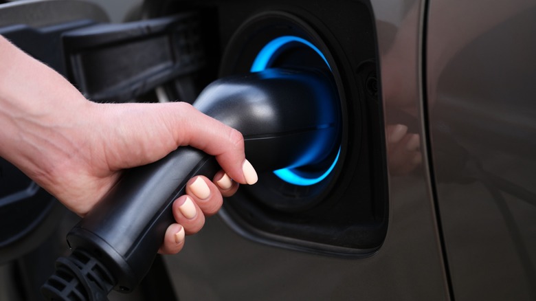 Using a fast charger to recharge the battery in an electric vehicle.