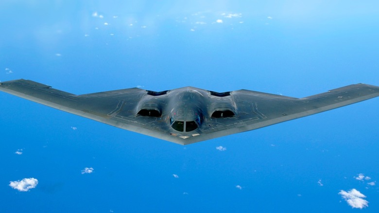 Front view of a B-2 Spirit bomber in flight.