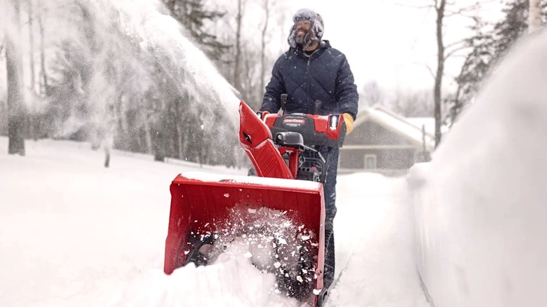 Person using Craftsman snow blower