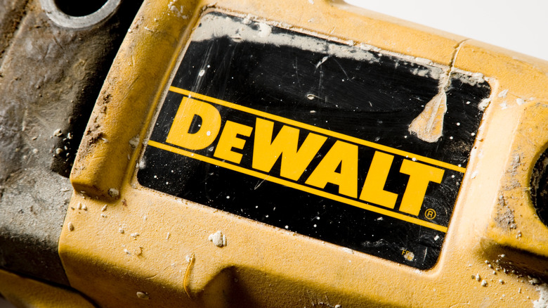 Closeup of the DeWalt logo on a used tool
